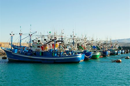 Group of trawlers docked at a harbor, Spain Stock Photo - Premium Royalty-Free, Code: 625-00805794