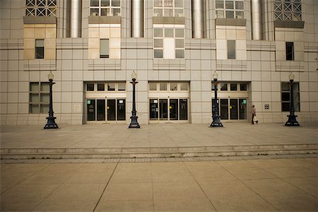 san francisco people - Side profile of a man walking in front of a building, San Francisco, California, USA Stock Photo - Premium Royalty-Free, Code: 625-00805875