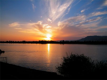 simsearch:625-01098291,k - Sunset over a river Stock Photo - Premium Royalty-Free, Code: 625-00805914
