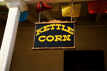 pillars for front porch - Low angle view of a sign for Kettle Corn, San Diego, California, USA Stock Photo - Premium Royalty-Free, Code: 625-00805911