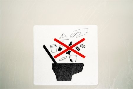 simsearch:625-00805855,k - Close-up of a lavatory disposal warning label Stock Photo - Premium Royalty-Free, Code: 625-00805937