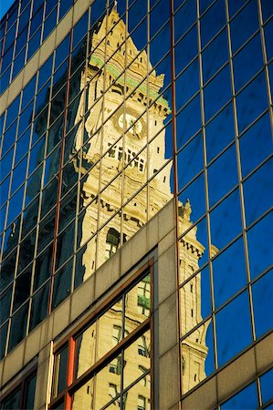 Low angle view of the reflection of a tower on the glass front of a building, Custom House, Boston, Massachusetts, USA Stock Photo - Premium Royalty-Free, Code: 625-00806320