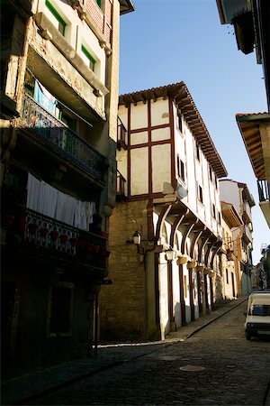 europe clothesline in the streets - Alleyway passing through a town, Spain Stock Photo - Premium Royalty-Free, Code: 625-00806358