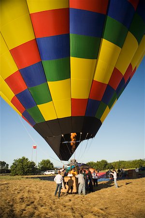 Hot air balloon preparing to take off Stock Photo - Premium Royalty-Free, Code: 625-00806363