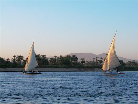 Two sailboats in a river, Nile River, Egypt Foto de stock - Sin royalties Premium, Código: 625-00806510