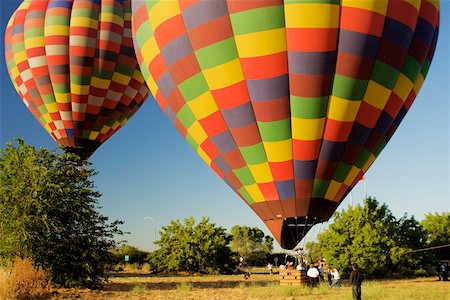 Hot air balloon preparing to take off Stock Photo - Premium Royalty-Free, Code: 625-00801395