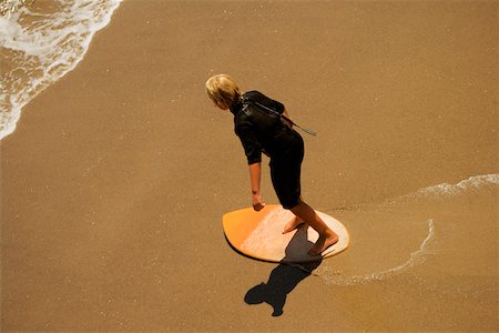 simsearch:625-00802074,k - High angle view of a boogie boarder on the beach Foto de stock - Sin royalties Premium, Código: 625-00801407
