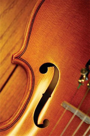 still life violin - Extreme close-up of violin bridge Stock Photo - Premium Royalty-Free, Code: 625-00801777