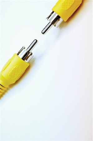 simsearch:625-00801801,k - Extreme close-up of two audio plugs Stock Photo - Premium Royalty-Free, Code: 625-00801819