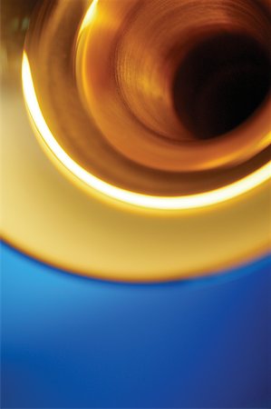 Low angle view of trumpet bell, close-up Stock Photo - Premium Royalty-Free, Code: 625-00801936
