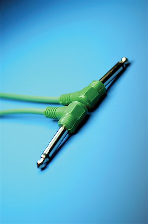 simsearch:625-00801801,k - Two green cables with audio plugs close-up Stock Photo - Premium Royalty-Free, Code: 625-00801961