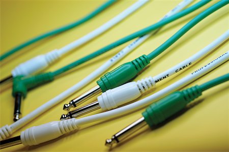 simsearch:625-00801801,k - Group of yellow and green cables with audio plugs, close-up Stock Photo - Premium Royalty-Free, Code: 625-00801995