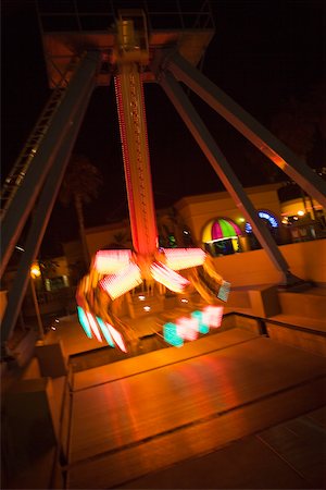 simsearch:625-00806318,k - Lights glowing on a carnival ride at night, California, USA Stock Photo - Premium Royalty-Free, Code: 625-00802039