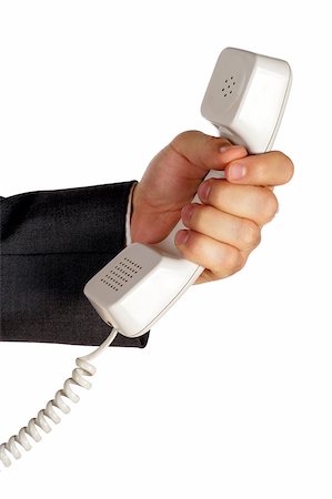 simsearch:625-00802665,k - Close-up of a businessman holding a telephone receiver Foto de stock - Sin royalties Premium, Código: 625-00802571