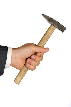 Close-up of a businessman holding a hammer Stock Photo - Premium Royalty-Free, Code: 625-00802588