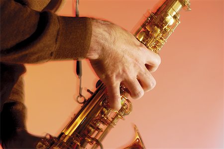 saxophone instrument - Musician playing the saxophone Stock Photo - Premium Royalty-Free, Code: 625-00802685