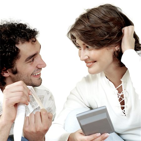 Close-up of a young couple smiling Stock Photo - Premium Royalty-Free, Code: 625-00836381