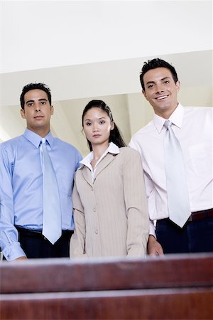 simsearch:625-00851478,k - Portrait of two businessmen and a businesswoman standing together Stock Photo - Premium Royalty-Free, Code: 625-00837885