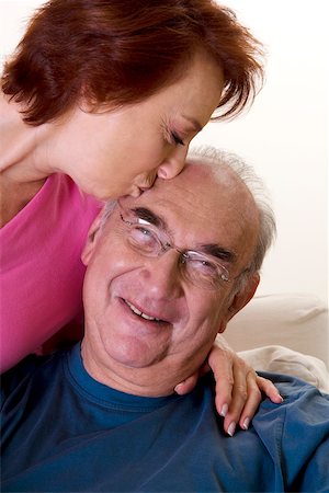 simsearch:625-00841593,k - Close-up of a senior woman kissing a senior man Stock Photo - Premium Royalty-Free, Code: 625-00839270