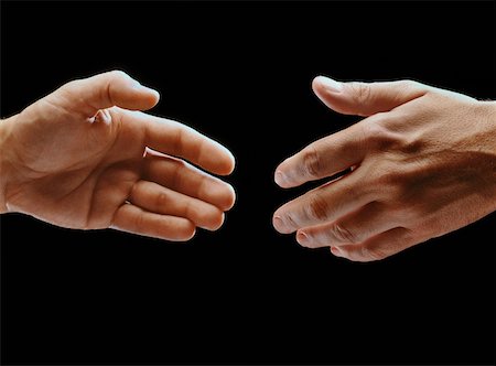 Close-up of two hands reaching towards each other Foto de stock - Sin royalties Premium, Código: 625-00849191