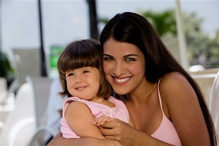 simsearch:625-00848874,k - Portrait of a mother with her daughter smiling Foto de stock - Sin royalties Premium, Código: 625-00849339