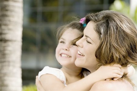 simsearch:625-00848874,k - Close-up of a daughter hugging her mother Foto de stock - Sin royalties Premium, Código: 625-00849496