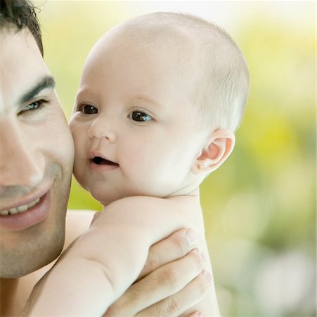 Close-up of a father with his baby girl Stock Photo - Premium Royalty-Free, Code: 625-00849503