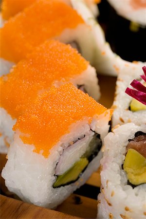 simsearch:693-06403356,k - Close-up of maki sushi in a row Stock Photo - Premium Royalty-Free, Code: 625-00849578