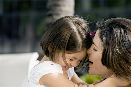 simsearch:625-00848874,k - Close-up of a daughter hugging her mother Foto de stock - Sin royalties Premium, Código: 625-00849864