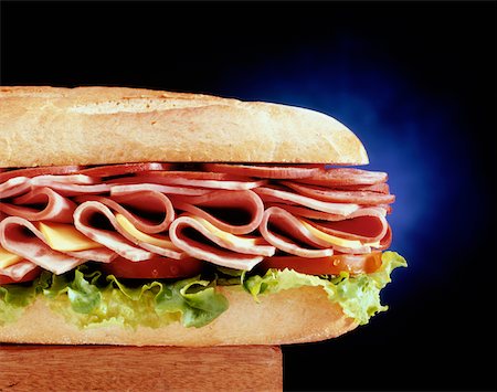 sausage sandwich - Close-up of a sandwich Stock Photo - Premium Royalty-Free, Code: 625-00849926