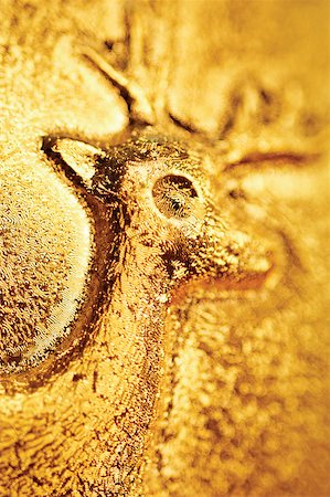 embossed seal - Close-up of a reindeer embossed on a Christmas ball Stock Photo - Premium Royalty-Free, Code: 625-00840244