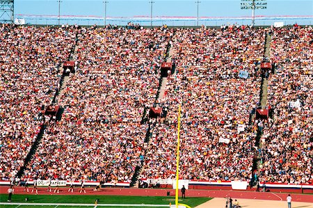 picture of a crowd watching a game - Crowd at the Los Angeles Coliseum Site of the 1984 Olympics Stock Photo - Premium Royalty-Free, Code: 625-00840422