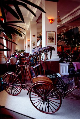 Trishaw in the lobby restaurant, Majestic Hotel, Ho Chi Minh City (formerly Saigon) Vietnam Stock Photo - Premium Royalty-Free, Code: 625-00840752