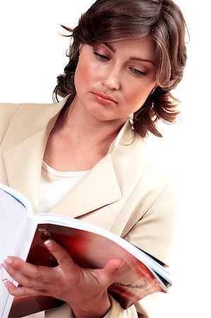 simsearch:625-02932995,k - Close-up of a businesswoman reading a magazine Stock Photo - Premium Royalty-Free, Code: 625-00841010