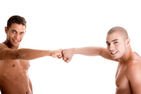 simsearch:625-00838657,k - Portrait of two young men with their fists together Stock Photo - Premium Royalty-Free, Code: 625-00841208