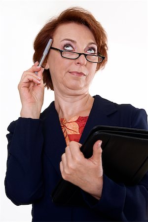 simsearch:625-00841639,k - Low angle view of a businesswoman holding a file and a pen Foto de stock - Sin royalties Premium, Código: 625-00841637