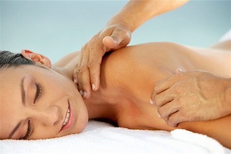 simsearch:625-00901115,k - Side profile of a young woman getting a back massage Stock Photo - Premium Royalty-Free, Code: 625-00841947