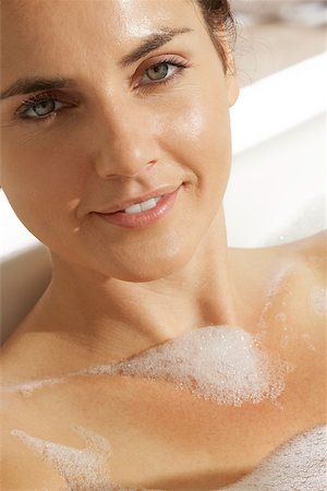reclining bathing beauty - Portrait of a young woman in a bubble bath Stock Photo - Premium Royalty-Free, Code: 625-00841967
