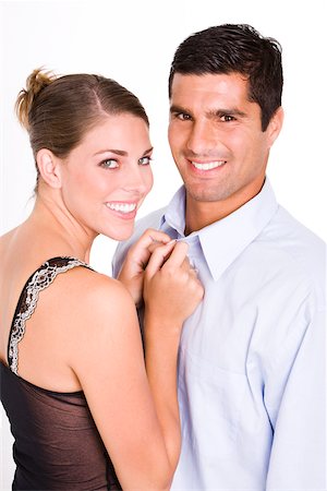 Portrait of a young woman and a mid adult man smiling Stock Photo - Premium Royalty-Free, Code: 625-00842697