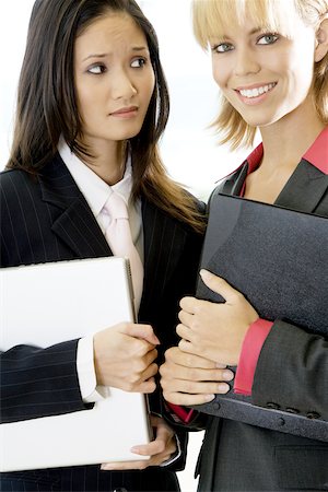 Portrait of two businesswomen smiling Stock Photo - Premium Royalty-Free, Code: 625-00850065