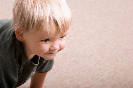 Close-up of a boy crawling Stock Photo - Premium Royalty-Free, Code: 625-00850461