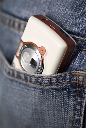 Close-up of a mobile phone in a pocket Stock Photo - Premium Royalty-Free, Code: 625-00897991