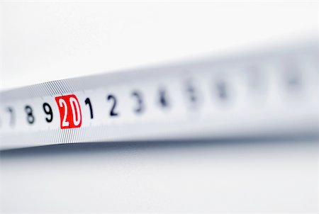 simsearch:640-01355019,k - Close-up of a measuring tape Stock Photo - Premium Royalty-Free, Code: 625-00898215