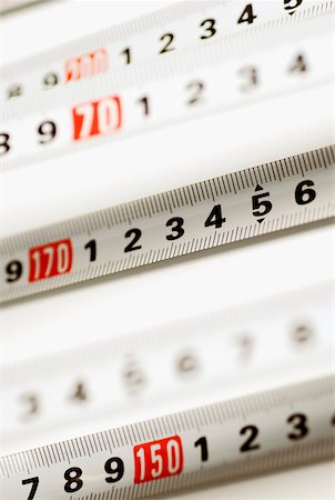 simsearch:640-01355019,k - Close-up of measuring tapes Stock Photo - Premium Royalty-Free, Code: 625-00898219