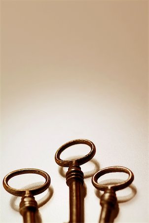 Close-up of three keys Stock Photo - Premium Royalty-Free, Code: 625-00898238