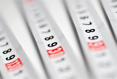simsearch:640-01355019,k - Close-up of four measuring tapes Stock Photo - Premium Royalty-Free, Code: 625-00898290