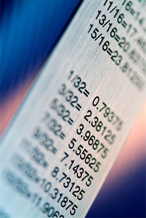 data numbers - Close-up of a ruler with a conversion table Stock Photo - Premium Royalty-Free, Code: 625-00898316