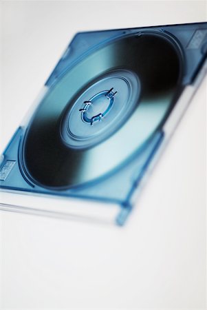 Close-up of a CD in a CD case Stock Photo - Premium Royalty-Free, Code: 625-00898382