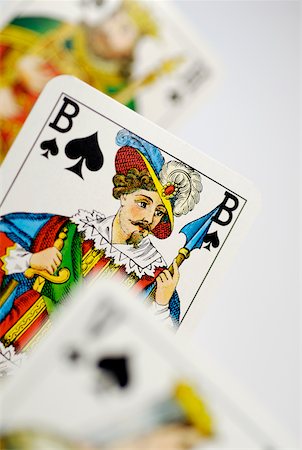 Close-up of three playing cards Stock Photo - Premium Royalty-Free, Code: 625-00898444