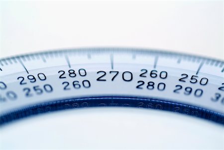 Close-up of a protractor Foto de stock - Royalty Free Premium, Número: 625-00898491